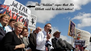 Tony Abbott in front of "ditch the witch" - Photo: Andrew Meares